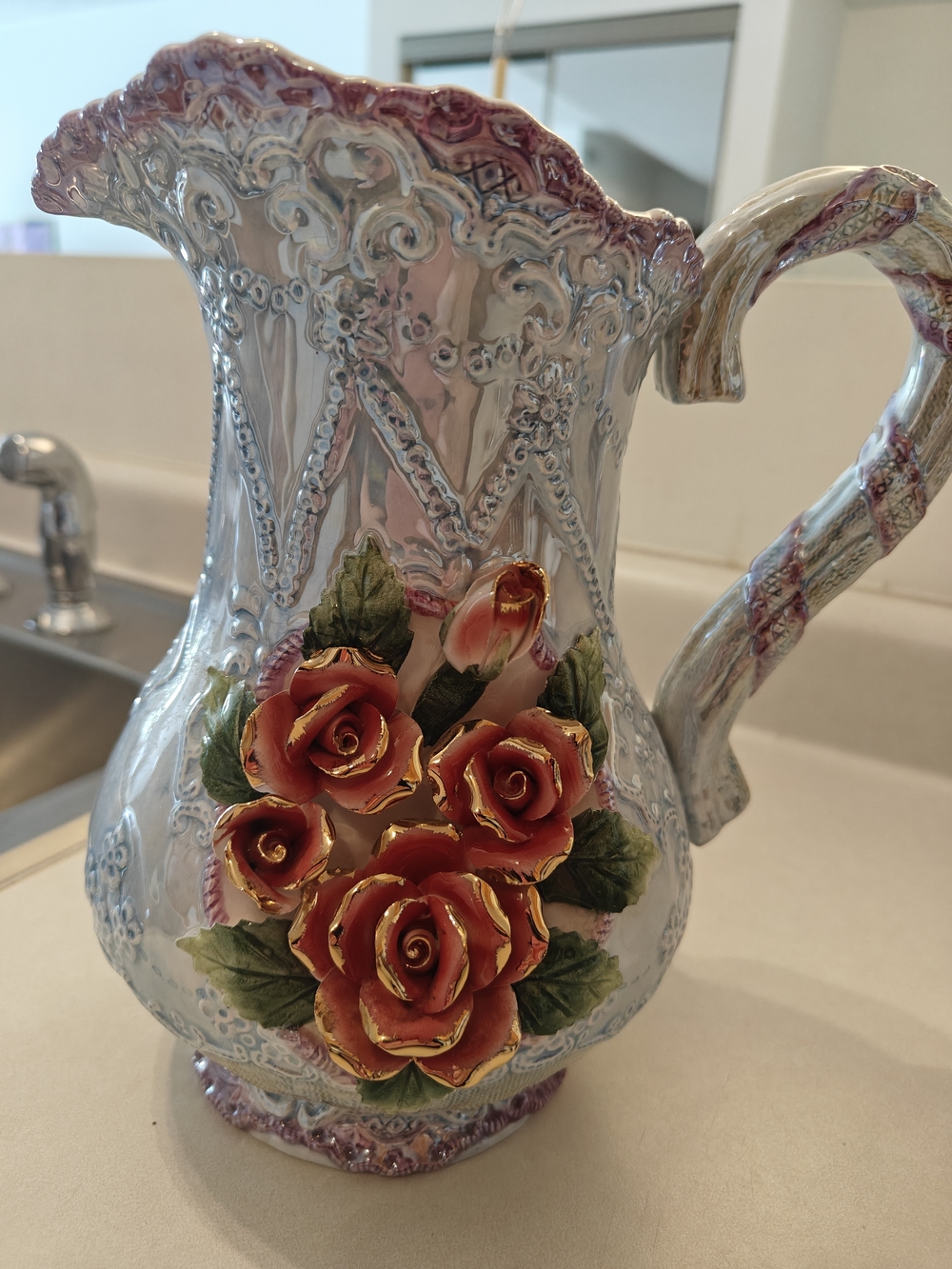 Ornate Ceramic Pitcher with Hand-Painted Roses